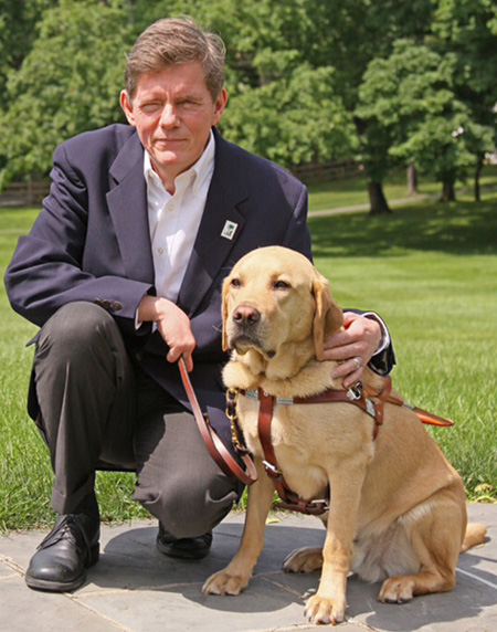 James Kutsch and his dog guide, Colby