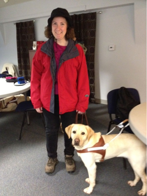 Holly and her dog guide, Tyra.