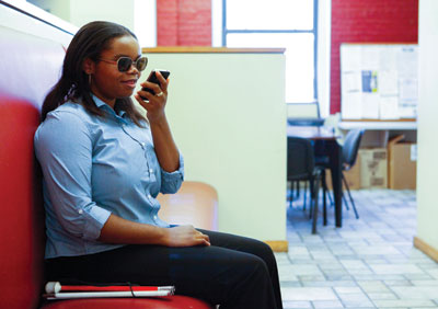 Woman using an Iphone