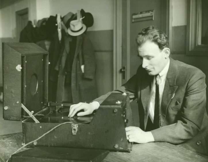 Blind worker at the American Foundation for the Blind tests a Talking Book machine before it is sent out, circa 1937. Talking Book Archives, American Foundation for the Blind.