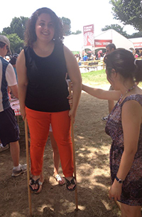 the author walking on stilts