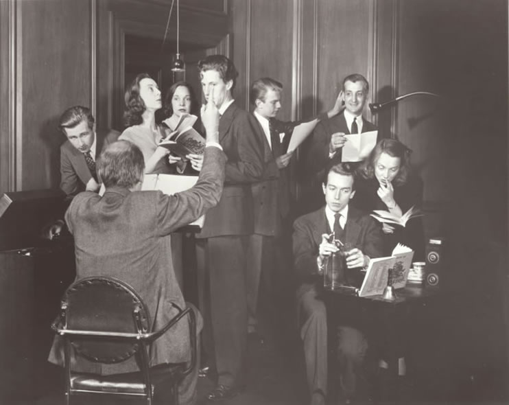 Actor Lloyd Bridges, pictured far left, is one of nine members of a cast recording The Romantic Age in a recording studio at the American Foundation for the Blind, 1938. Other members of the cast (left to right) are Ann Tyrrell, Grace Coppin, Wesly Addy, George Keane, Alwin Back, William Nichols, and Peggy Converse. Talking Book Archives, American Foundation for the Blind.