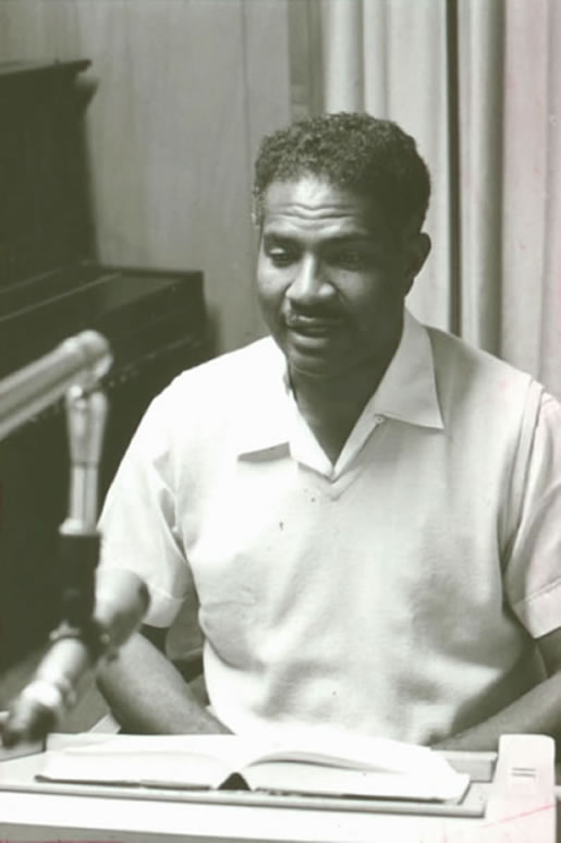 Actor Ossie Davis is narrating a Talking Book in the recording studios of the American Foundation for the Blind. The photograph is undated. Talking Book Archives, American Foundation for the Blind.