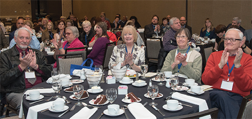 AFB Leadership Conference attendees seated around a table during one of the awards ceremonies at the conference.