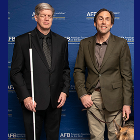 Kirk Adams stands next to Erik Weihenmayer