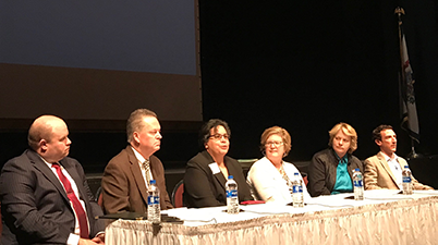 Panelists seated left to right: Ryan Saxe, Mike Owens, Monica Brooks, Cathy Burns, Stephanie A. Skolik, and Isaac lidsky