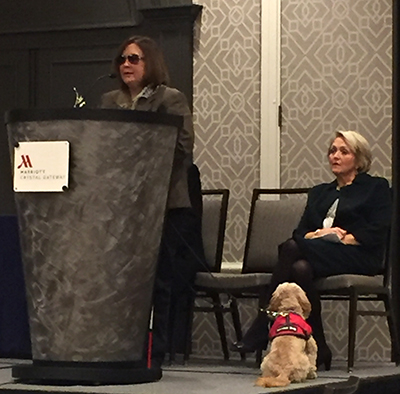 Susan Mazrui at the podium, accepting her Stephen Garff Marriott Award