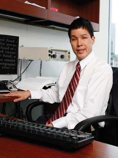 Man at desk with keyboard