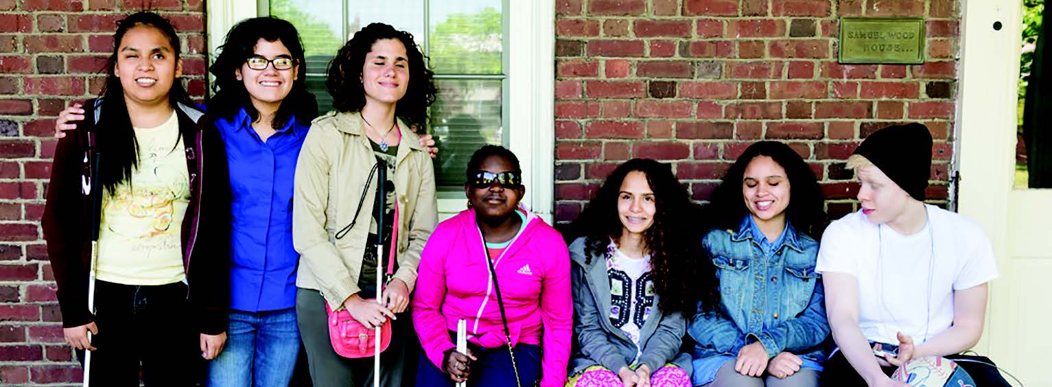 Students gathered outside for a school photo.