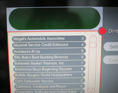 Photo of touch-screen directory listing with entries including Abigail's Automobile Associates 3; Abysmal Service Credit Enforcers 4; Architect's-R-Us 5; Billy Bob's Best Bucking Broncos 6.