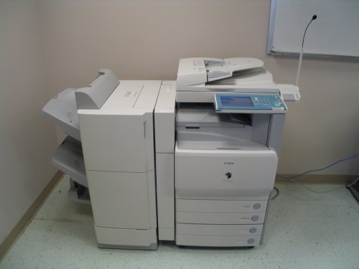 Photo of the Canon imageRUNNER copier with the Voice Operation Kit microphone at the right.