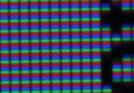 Photo of an emissive (self-lit), pixelated (matrix of microscopic dots) display screen (color)