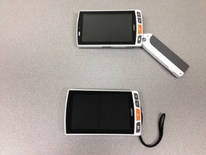 Photo of the CANDY Grip and CANDY electronic magnifiers.